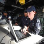 navy quartermaster with computer on USS ashland