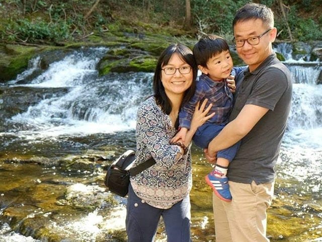 Xiyue Wang with his wife and son
