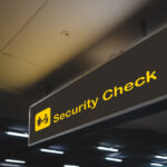 Security check within airport sign.