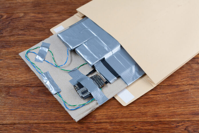 Hand made Improvised Explosive Device with plastic explosive C-4 and cell phone GSM module in envelope