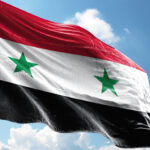 3d Illustration Flag of Syria waving in the wind against a blue sky with clouds
