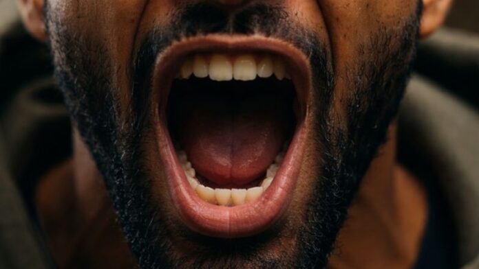 angry looking man, hate chanting